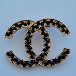 Gold-Tone Brooch with Black Crystals -